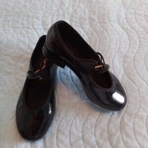 Girls dance now black tap shoes.  girls size 12